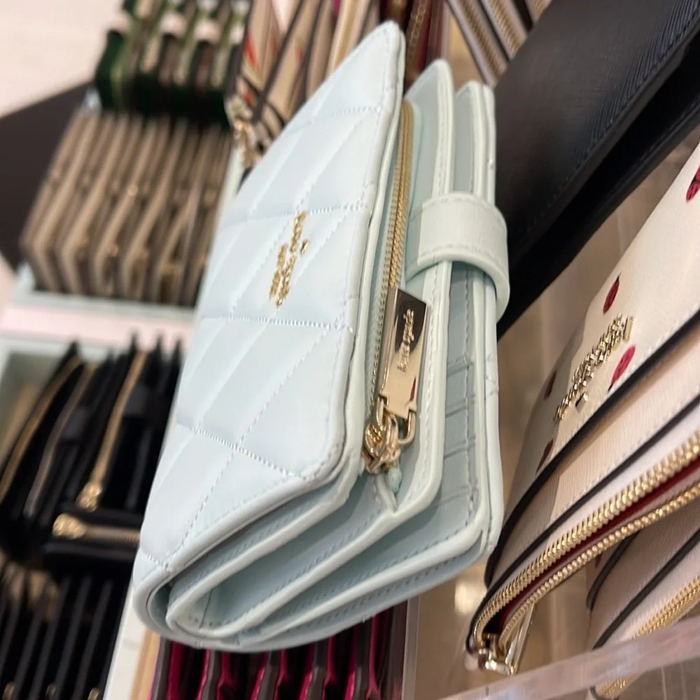 Kate Spade Carey Medium Compartment Bifold Wallet 
COLOR: Turquoise - Picture 5 of 16